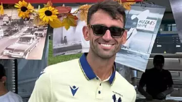 One Bite Pizza Festival Polo Shirt worn by Carl Radke in One Bite Pizza Fest is BACK For 2025