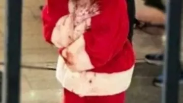 Red Santa Coat worn by Art The Clown (David Howard Thornton) in Film Terrifier 3