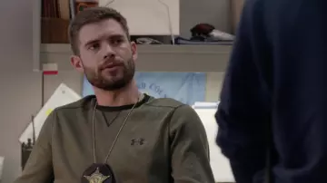 Under Armour Sweatshirt worn by David McDougall (David Corenswet) as seen in We Own This City TV show outfits (Season 1 Episode 1)