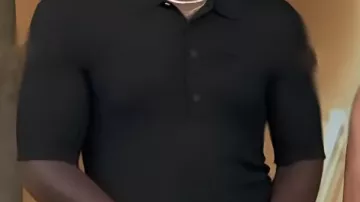 Black Knit Polo Shirt worn by Scott Evans in Access Hollywood