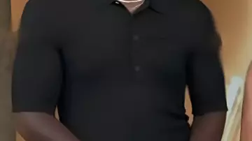 Black Knit Polo Shirt worn by Scott Evans in Access Hollywood