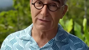 Eugene Levy Blue Shirt worn by Self - Host (Eugene Levy) in The Reluctant Traveler with Eugene Levy