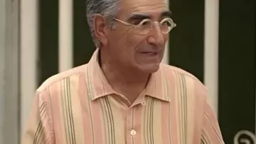 The Reluctant Traveler Eugene Levy Striped Shirt worn by Self - Host (Eugene Levy) in The Reluctant Traveler with Eugene Levy (S02)