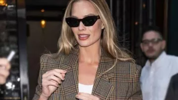 Tribeca NYC Plaid Coat worn by Margot Robbie in Margot Robbie Leaves Her Hotel En Route To The "A Big Bold Beautiful Journey" Premiere in NYC