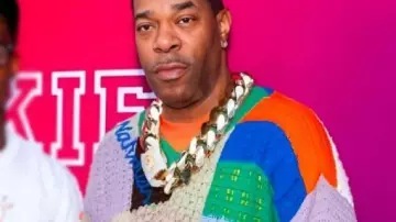Crochet V-Neck Rainbow Sweater worn by Busta Rhymes (Busta Rhymes) as seen in Busta Rhymes - Everything Remains Raw