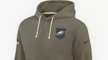 Philadelphia Eagles Olive Salute To Service Hoodie worn by (Travis Kelce) as seen in Philadelphia Eagles - The Complete History