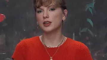 Taylor Swift Short Sleeve Orange Crew in the music video Taylor Swift directing her music video behind the scenes for Life of a Showgirl...