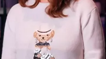 Suéter usado por Reba McEntire en The Voice