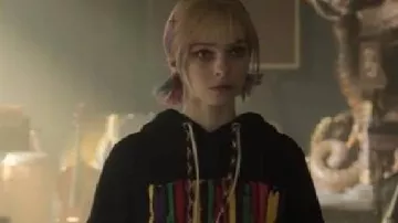 Wednesday S02 Emma Myers Embroidered Cropped Hoodie worn by Enid Sinclair (Emma Myers) as seen in Wednesday (S02E06)