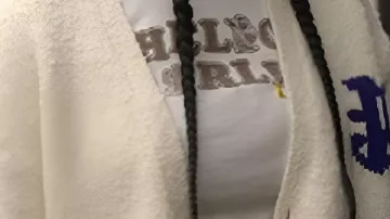 White Cardigan worn by (Aderinsola Olabode) in Reasonable Doubt