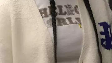 White Cardigan worn by (Aderinsola Olabode) in Reasonable Doubt