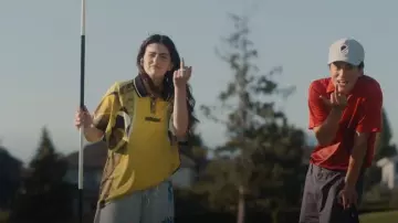 Metalwood Studio Green & Yellow Turbo Polo worn by Zero (Lilli Kay) as seen in Stick (S01E06)