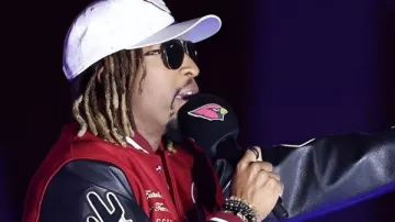 Arizona Cardinals Lil Jon Varsity Jacket in the music video Nelly - Air Force Ones ft. Kyjuan, Ali, Murphy Lee (Official Music Video)