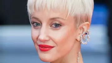 Maison Dauphin Jewelry – gold earring worn by British actress Andrea Riseborough at the European Premiere of Battle of the Sexes in 2017, London