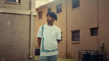 Dior x Shawn White Border Print T Shirt worn by 21 Savage in 21 Savage x Metro Boomin - Runnin (Official Music Video)
