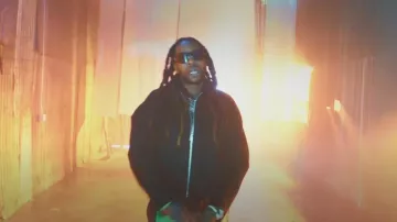 Chaqueta con cremallera y puntada en contraste negra y verde de Bottega Veneta usada por 2 Chainz en 2 Chainz - Kingpen Ghostwriter ft. Lil Baby