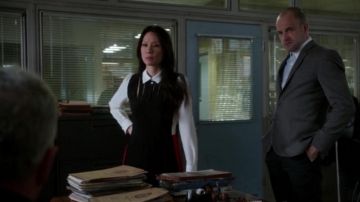 la robe de Joan Watson ( Lucy Liu) dans Elementary