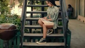 nakia is wearing a converse