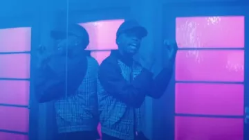 Burberry Beige Check & Black Sleeve Bomber Jacket worn by Quando Rondo in Quando Rondo - Bad Vibe (feat. A Boogie Wit da Hoodie & 2 Chainz) [Official Music Video]