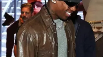 House of Innovation NY Leather Jacket worn by Travis Scott in Travis Scott & Kim Kardashian at the Nike x Skims launch celebration at Nike House of Innovation