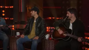 Bode Khaki Peerie Rib Banbury Bomber Jacket worn by Nick Jonas as seen in The Kelly Clarkson Show on  September 22, 2025