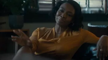 Blusa Kobi Halperin Nellie en bronce usada por la Dra. Carol Pierce (Tamberla Perry) como se ve en Mentes brillantes (S01E09)