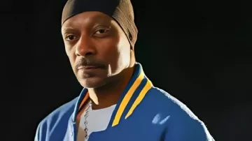 Snoop Dogg AFL Limited Edition Bomber Jacket in the music video Snoop Dogg's AFL grand final announcement met with fierce backlash | 9 News Australia