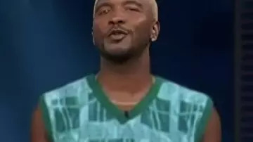 Access Hollywood 2025 Teal Green Graphics Vest worn by Scott Evans as seen in Access Hollyood Live