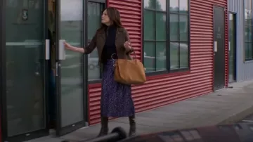 Ganni Crinkle Satin Floral Midi Skirt worn by Cassandra Lee (Kristin Kreuk) as seen in Murder in a Small Town (S02E02)