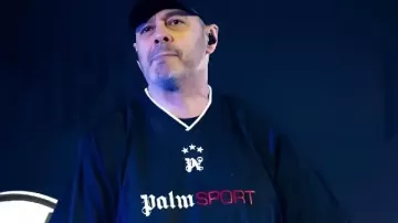 Fabri Fibra MILANO Black T-shirt in the music video Fabri Fibra - In Italia 2024 (#rilive Milano 2025)