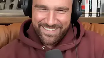 Travis Kelce New Heights Maroon Graphic Hoodie in Taylor Swift on Reclaiming Her Masters, Wrapping The Eras Tour, and The Life of a Showgirl | NHTV