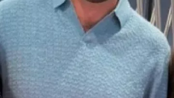 Sky Blue Polo Sweater worn by Travis Kelce in Jason Kelce asks Travis Kelce when the wedding is in interview with Patrick Mahomes, Andy Reid