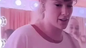 Release Party Of A Showgirl White T-Shirt worn by Taylor Swift in Taylor Swift - The Life of a Showgirl (Feat. Sabrina Carpenter) (Lyric Video)