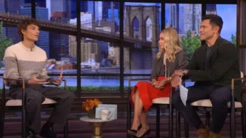 Saint Laurent Polka Dot Tie-Neck Button Down Silk Blouse worn by Kelly Ripa as seen in LIVE with Kelly and Mark on October 7, 2025