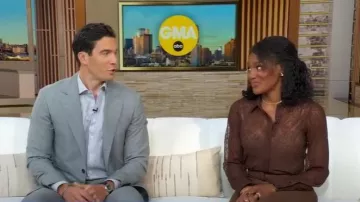 Express Sheer Lace Essential Shirt worn by Janai Norman as seen in Good Morning America on October 7, 2025