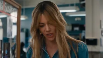 Mignonne Gavigan Alita Fruit Novelty Linear Resort Earrings worn by Morgan Gillory (Kaitlin Olson) as seen in High Potential (S02E04)