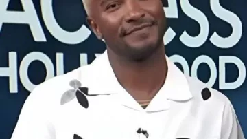 Access Hollywood Chemise à fleurs blanche et noire Scott Evans portée par (Scott Evans) à Access Hollywood