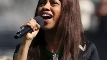 The Dallas Cowboys Vs New York Jets Game T-Shirt worn by (Sasha Allen) as seen in The New Dallas Cowboys Christmas '86 Music Video