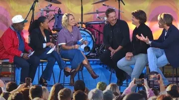 Larroudé Dolly Broderie Slip On Sandals worn by Sheinelle Jones as seen in Today on October 10, 2025