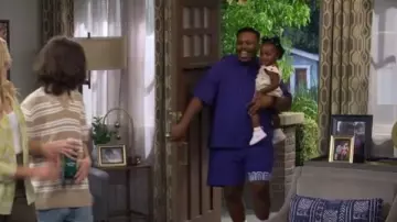 Mode of One Regular Fit Logo Print 7" French Terry Shorts worn by Marty Butler (Marcel Spears) as seen in The Neighborhood (S08E01)