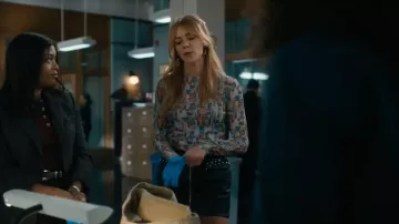 Akris Punto NYC Paper Collage Print Top worn by Morgan Gillory (Kaitlin Olson) as seen in High Potential (S02E05)