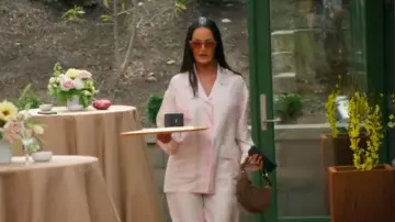 Prada Arqué Suede Shoulder Bag worn by Lisa Barlow as seen in The Real Housewives of Salt Lake City (S06E05)