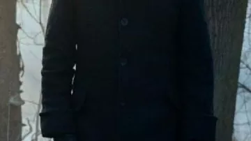Black Long Coat worn by Fred Armisen in Wednesday