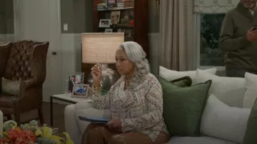 Elie Tahari The Ciaran Gilded Chain Printed Draped Blouse worn by Anita Dupree (Tamara Tunie) as seen in Beyond the Gates (S01E137)