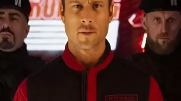 The Running Man 2025 Glen Powell Red Jacket worn by Ben Richards (Glen Powell) in The Running Man