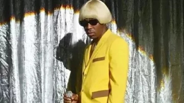 Tyler the Creator Bellhop Yellow Suit worn by Self (Tyler, The Creator) as seen in Tyler, The Creator - CHROMAKOPIA Live at Camp Flog Gnaw 2024