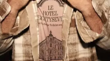 Graphic White T-Shirt worn by Travis Kelce in Travis Kelce spotted enjoying the view from Taylor Swift’s lavish hotel room in Sydney. #Shorts