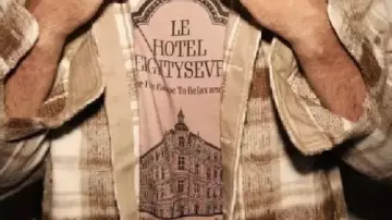 Graphic White T-Shirt worn by Travis Kelce in Travis Kelce spotted enjoying the view from Taylor Swift’s lavish hotel room in Sydney. #Shorts