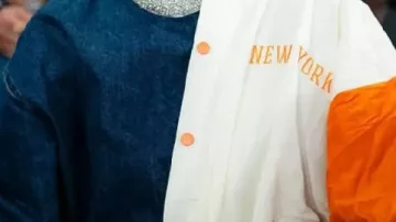 White & Orange Jacket worn by Anne Hathaway in Anne Hathaway celebrates NewYork Knicks Win Against Celtics in the playoffs