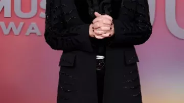 Black Embellished Blazer worn by Reba McEntire in Reba McEntire Introduces Alan Jackson's Performance (Live from the 60th ACM Awards)